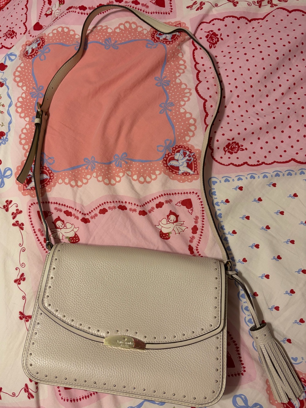 kate spade Cream Pebbled Leather Crossbody with Tassel